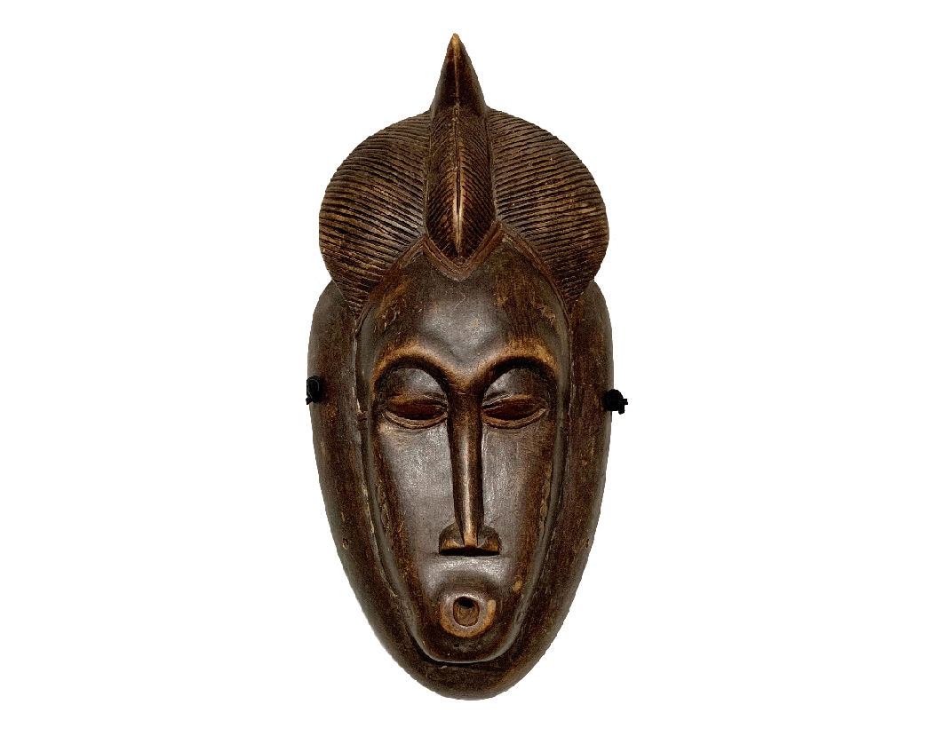 A wooden mask depicting African Art - Click on this image to access the African Art Exhibit website