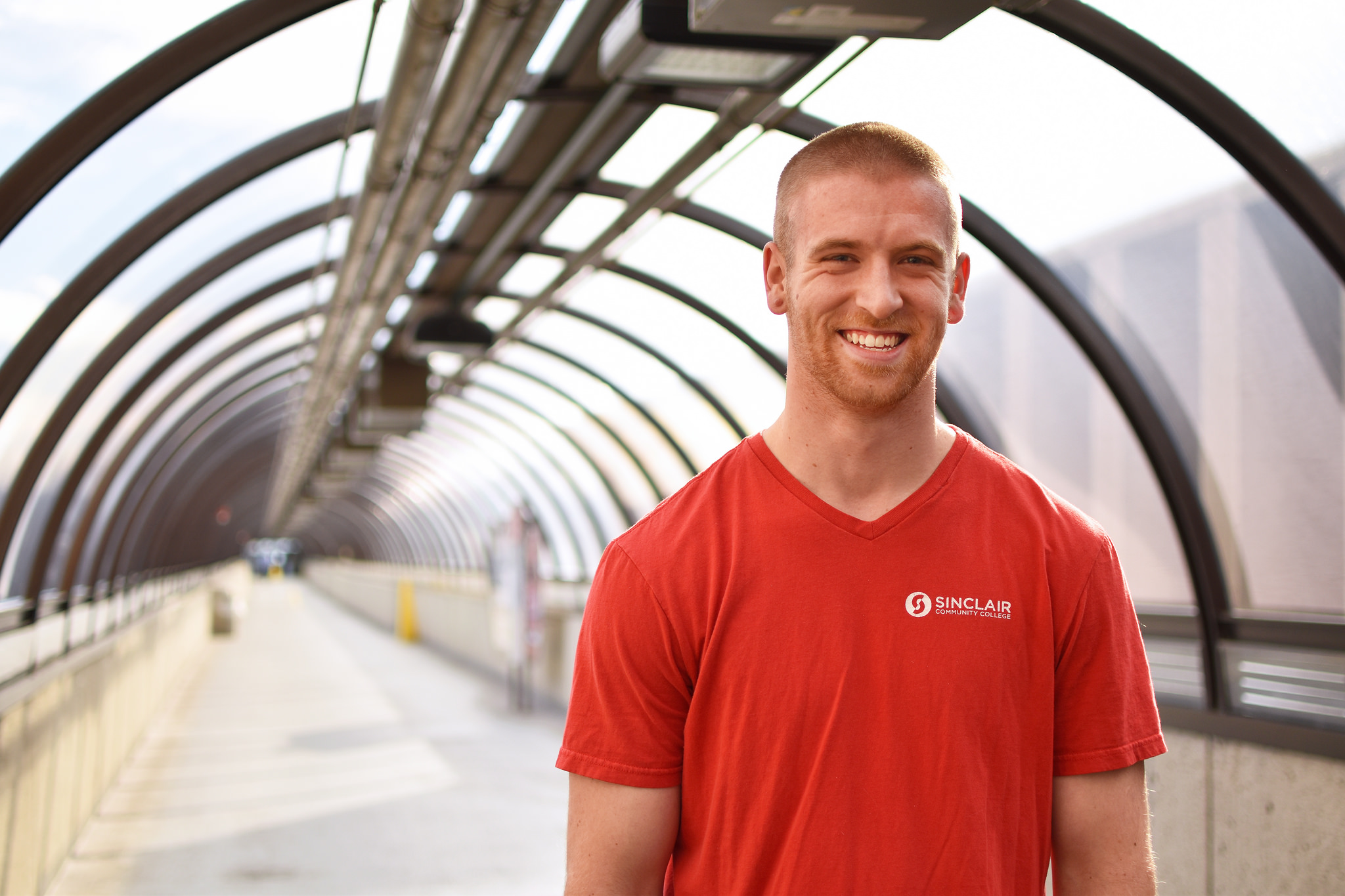 Sinclair Male Student standing in Campus Tunnel