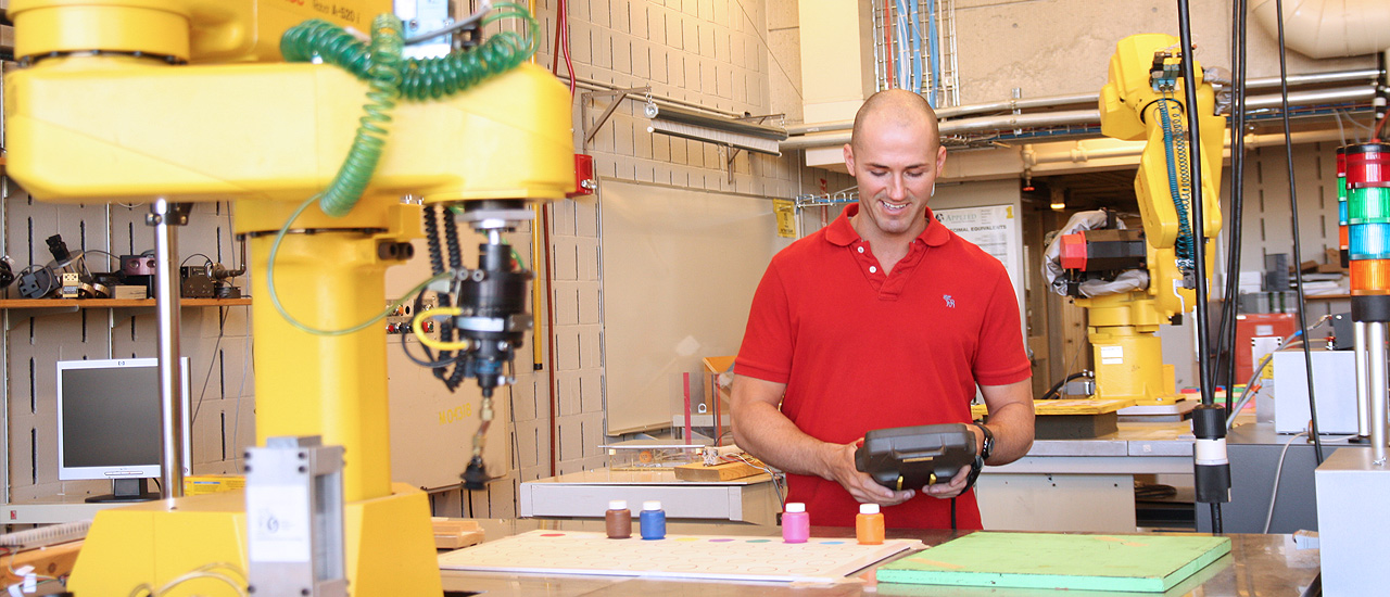 Student success Todd Sollar working in Automation and Control Technology.
