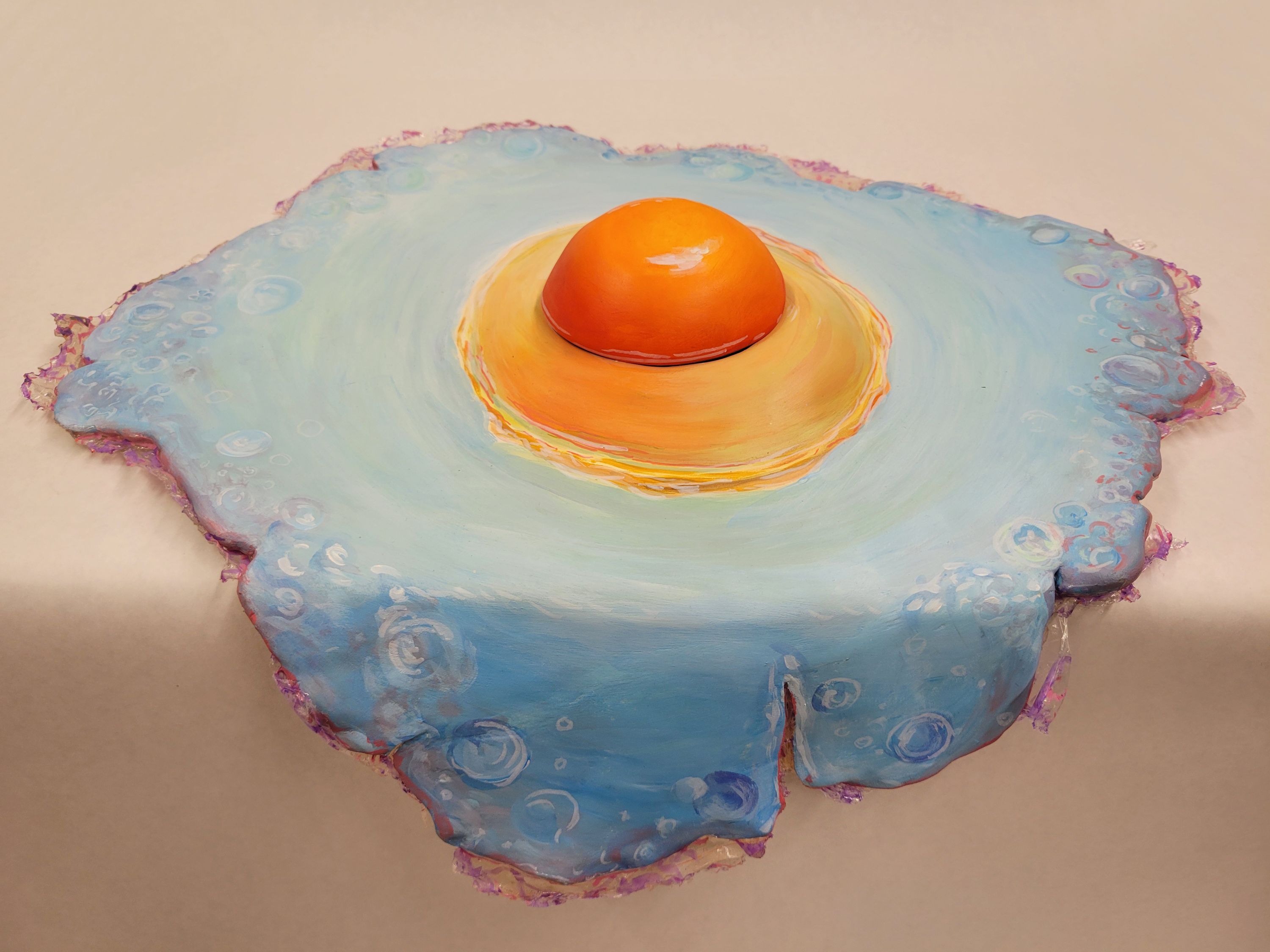 This art piece is named "The Eggs Ember'"